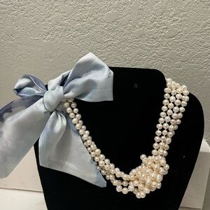 Elegant Pearl Necklace with Satin Bow